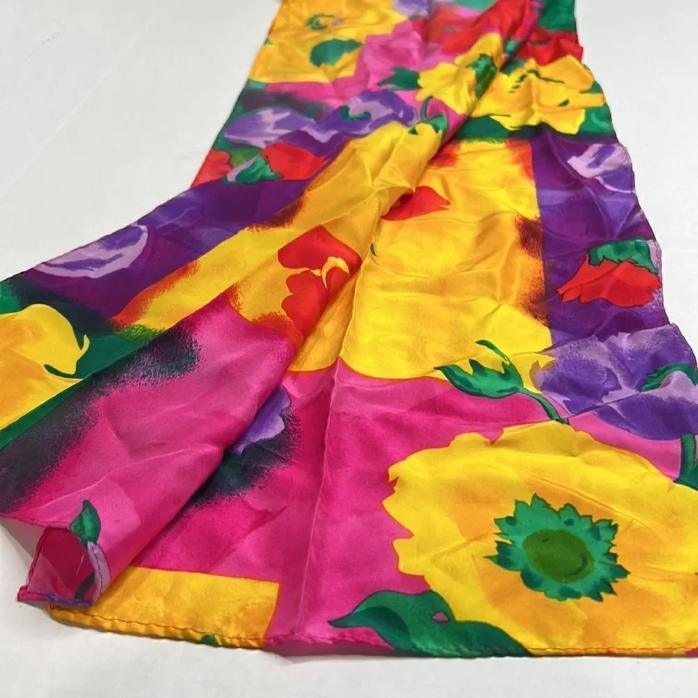 Vibrant floral silk scarf with gold purple pink and red flowers.